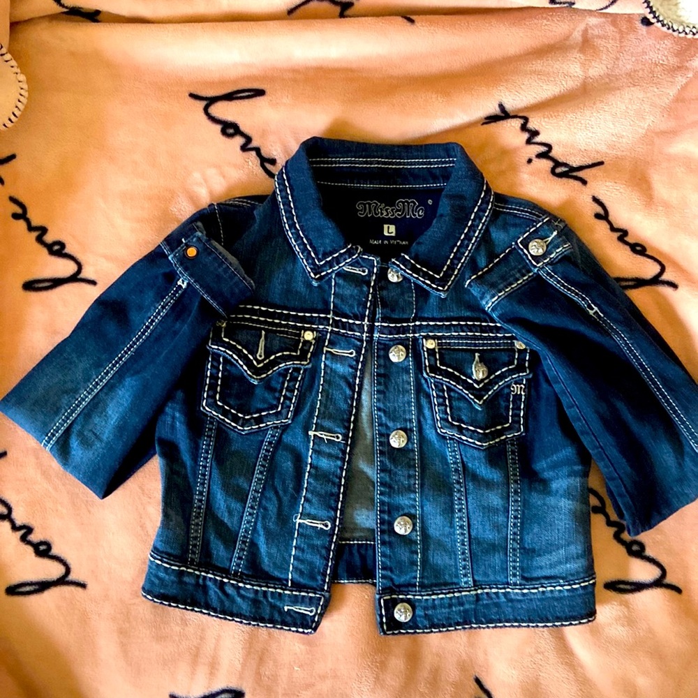 A Miss Me jean jacket in a size large (L)